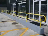 Yellow safety DDA disability handrails