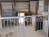 Interclamp steel handrails fitted on an indoor balcony 