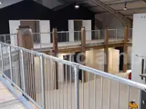 Indoor balcony fitted with Interclamp handrails for safety