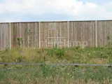 handrail safety barrier in front of fence door access