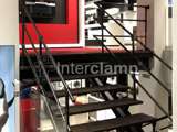 Stairway barrier and handrails inside Miele shop